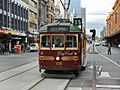 A W7-class tram on Flinders Street