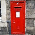 Elizabeth II era Royal Mail wall box in Edinburgh, showing the Crown of Scotland