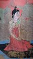 A Tang Dynasty Woman with Flower, dressed in ruqun.