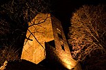 Medieval castle tower at night