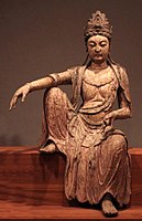 Chinese statue of Avalokiteśvara looking out over the sea, c. 1025 CE.