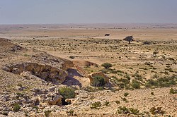Limestone escarpments near Al Kharrara