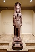 Amenhotep III; c. 1390-1352 BC; quartzite; height: 2.49 m; Luxor Museum (Luxor, Egypt)[185]