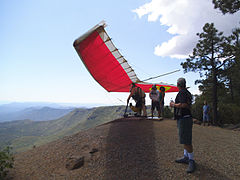 A hang glider preparing for launch at Mingus Mountain