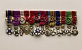 Miniature medal bar of Drees, showing all of his foreign and domestic decorations, as well as the grade.