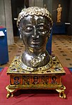 Head of pope Alexander; 1145; wood, silver, gilt bronze, gems, pearls and champlevé enamel; height: c. 45 cm; Art & History Museum (Brussels, Belgium)[131]