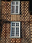 Windows of the Hôtel Racape de La Feuillée at Place des Lices