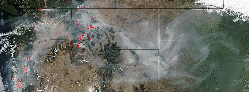True-color satellite image showing the Western states and provinces with smoke