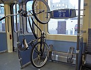 Vertical bike rack on an American light rail train