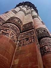 Stone facing of Qutub Minar on its rubble core
