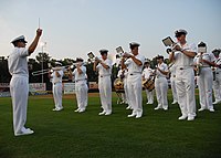 The U.S. Naval Academy Band performing the U.S. national anthem on the field of Prince George's Stadium.