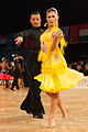 Young couple dancing cha-cha-cha at competitions in Austria.
