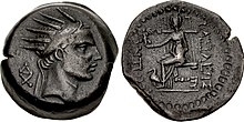 Coin with Antiochus IV likeness on the obverse and the statue of a seated deity on the reverse