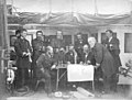 A posed photograph of a council of war of United States Navy officers off Korea aboard the Asiatic Squadron flagship USS Colorado in preparation for the June 1871 United States expedition to Korea.