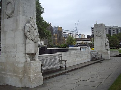 The two sentries flanking the stone bearing the main dedication