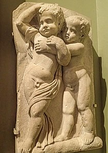 Fragment of a marble sarcophagus depicting two drunken boys from a Bacchic revel, made in Athens 140-150 CE