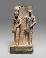 A statue of Wepwawet with the goddess Isis-Hathor, which belonged to an official named Siese who worked under Ramesses II