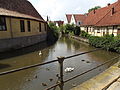 Moat with civic houses bordering on it in Steinfurt