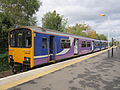 A Northern Rail Class 150 waits with a service to Preston on the Ormskirk branch line.