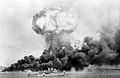 Image 32An oil storage tank explodes during the first Japanese air raid on Darwin on 19 February 1942 (from Military history of Australia during World War II)