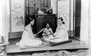 Korean women, wearing white, performing dadeumi (c. 1910s)