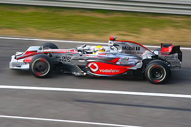 Lewis Hamilton driving for McLaren towards his final win of his championship winning 2008 Formula One season