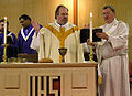 A United Methodist elder celebrating the Eucharist