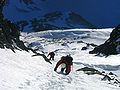 Two mountaineers descending a snow/ice gully from Malý Ľadový štít in the High Tatras.