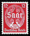 Briefmarke des Deutschen Reiches aus dem Jahr 1934 zur Vorbereitung der Saarabstimmung: Reichsadler vor aufgehender Hakenkreuz-Sonne mit der Aufschrift Saar