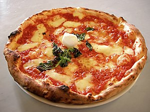Pizza is a Neapolitan dish and one of the world's most popular fast foods.