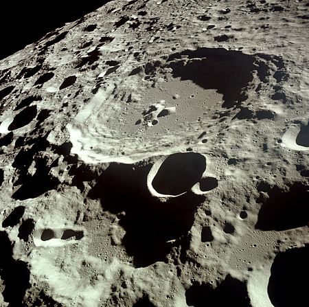 The far side of the Moon as photographed by the crew of Apollo 11. The largest crater is Daedalus crater.
