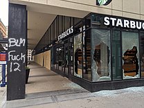 A damaged coffee shop in Minneapolis, Minnesota on May 29
