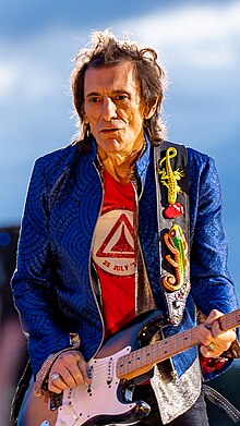 Wood on stage with the Rolling Stones in 2022