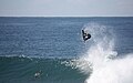 Airborne surfer off Ballito Beach