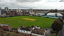 Aerial colour photograph showing a cricket ground
