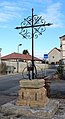 Wegekreuz aus Eisen in Vraux, Frankreich