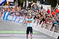 Primož Roglič receives the 2023 Giro d'Italia winner's trophy