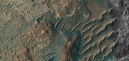 Close, color view of unusual TARs, as seen by HiRISE under HiWish program. These features may have had variable local winds to make the wavy tops.