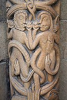 Adam and Eve eating apples, west front of Lincoln Cathedral (12th century)