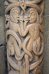 12th-century carving of Adam and Eve eating apples