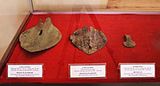 Bronze ploughshares and axe head