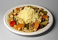 Image 26Couscous (Arabic: كسكس) with vegetables and chickpeas, the national dish of Algeria (from Culture of Algeria)