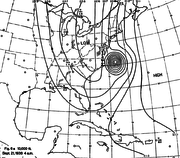 Extratropical transition gradually begins as the hurricane interacts with the frontal boundary on September 21