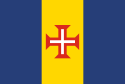 Blue-gold-blue vertical triband with a red-bordered white Cross of Christ.