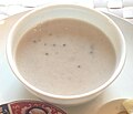 Filipino ginataang munggo, a sweet rice gruel with mung beans and coconut milk, sugar, and pandan leaf extract