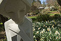 A sculpture by Frank Lloyd Wright greets garden visitors interested in seeing the April flowers.