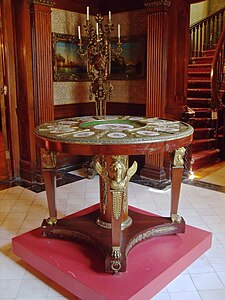 Empire style table with caryatids en gaine supported by bare feet, early 19th century, wood, metal, glass, pigment, and porcelain, Musée Dufresne-Nincheri, Montreal, Canada