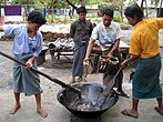 The traditional way of making special glutinous rice htamanè is still practiced