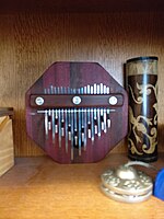 An octagonal mbira of high craftsmanship which spans two octaves.