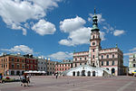 Zamość City Hall, designed by Bernardo Morando, is a unique example of Renaissance architecture in Europe, consistently built in accordance with the Italian theories of an "ideal town".[278]
